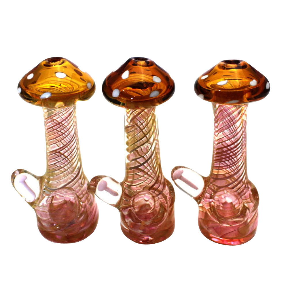 4.5-inch gold fumed mushroom standing heavy-duty glass pipe featuring gold-fumed detailing, mushroom-inspired design, extra-heavy glass construction, smooth polished finish, and sturdy styling.