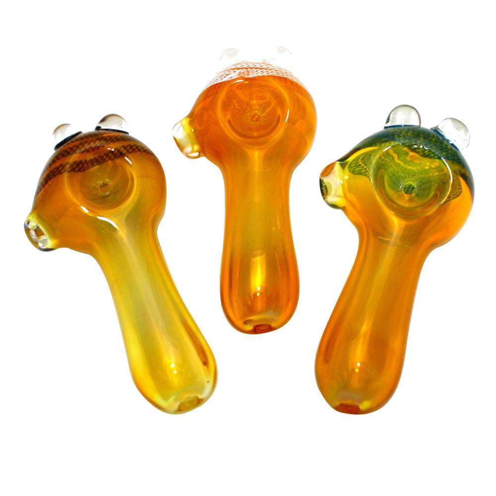 4-inch cube head gold fumed heavy-duty glass hand pipe featuring thick glass construction, cube-shaped head, gold-fumed detailing, smooth finish, and bold artistic styling.
