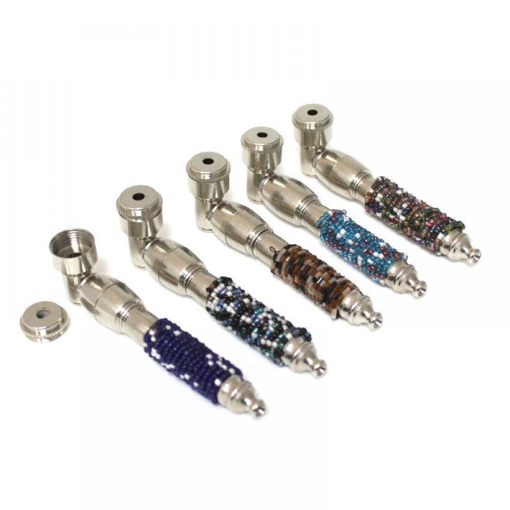 4-inch fancy design metal pipe with cover featuring decorative detailing, durable metal construction, compact size, and protective cover.