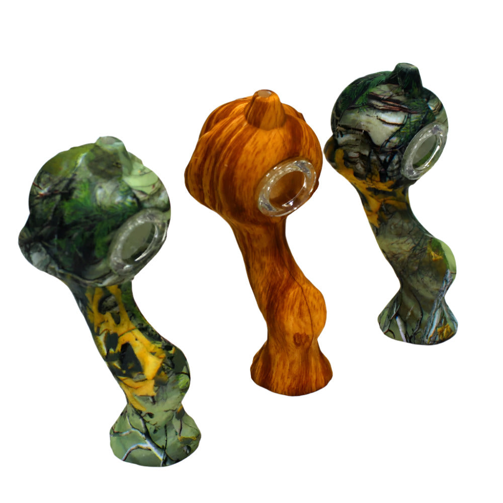 4.5-inch Color Print Silicone Pumpkin Hand Pipe with Glass Bowl featuring a colorful pumpkin design, durable silicone construction, compact size, and lightweight build.