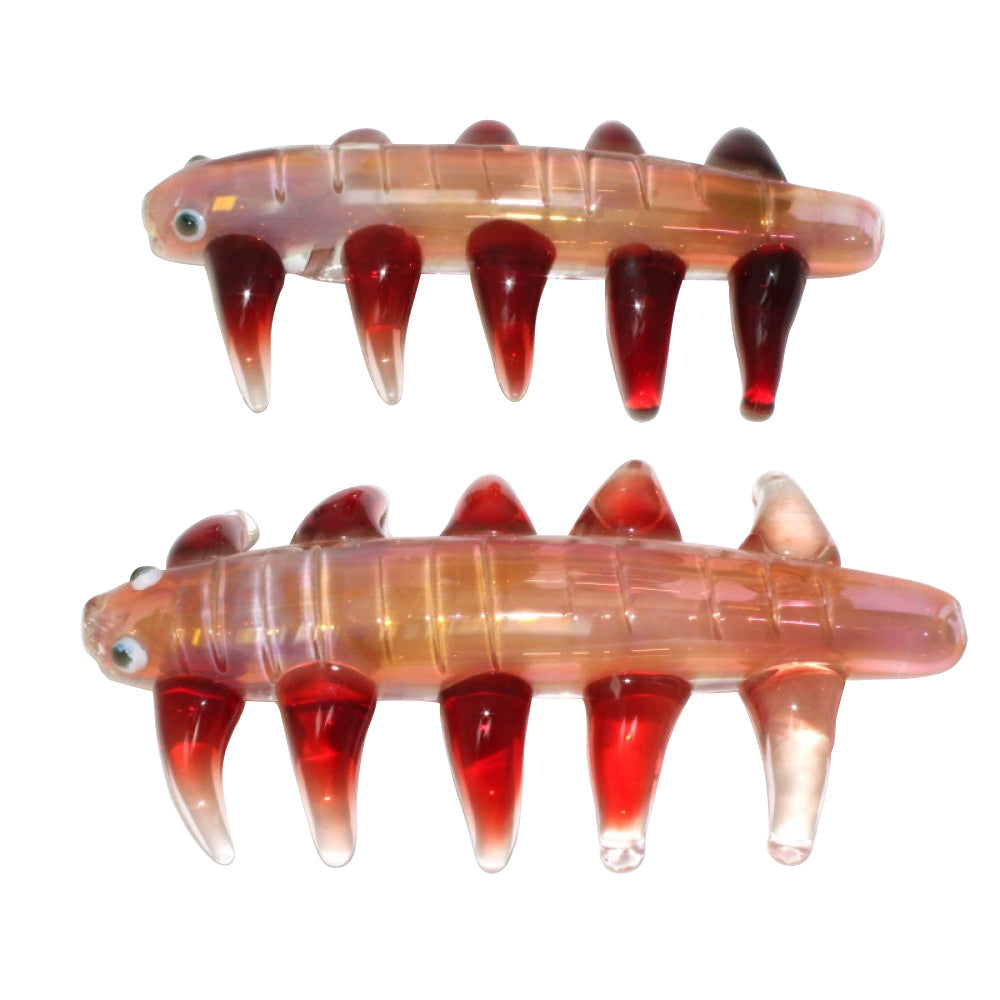 5.5-inch insect design spiked gold fumed glass hand pipe featuring detailed insect-inspired styling, spiked accents, gold-fumed glass, durable construction, and artistic glasswork.