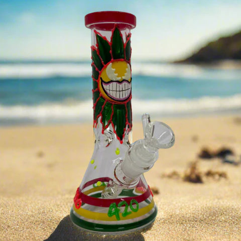 Glow in dark beaker bong with colorful multi design artwork