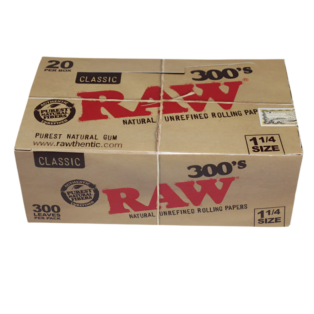 RAW Classic 300's 1¼ Size Rolling Papers featuring classic RAW paper, natural brown appearance, lightweight design, and 20 booklets per box.