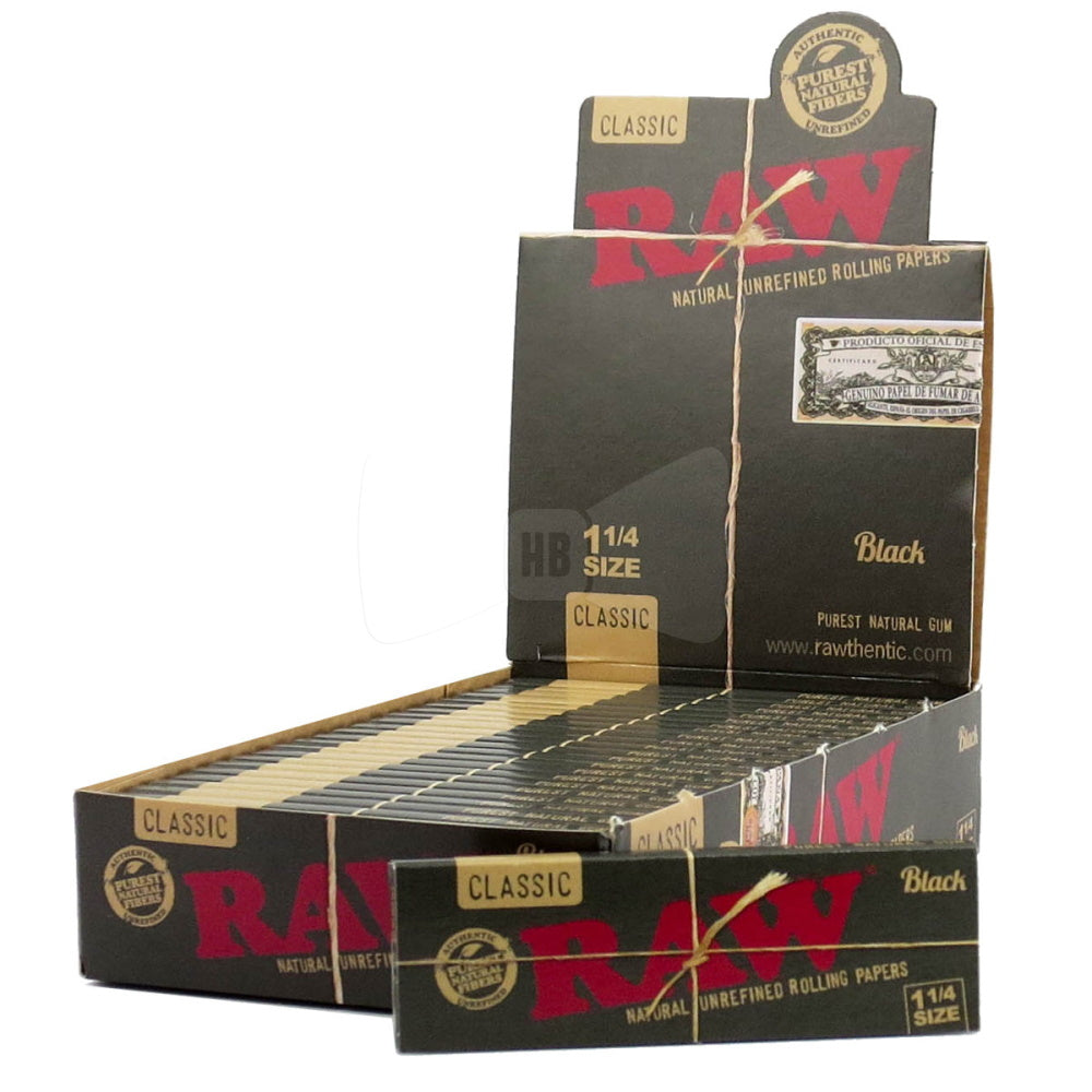 RAW Classic Black 1¼ Size Rolling Papers featuring a sleek black design, thin lightweight paper, and 50 leaves per pack.