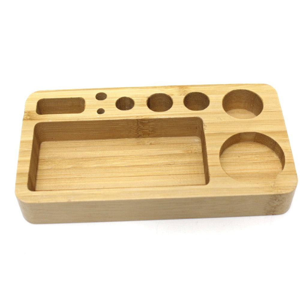 Small 5.5 x 3 inch Bamboo Rolling Tray featuring a natural wood finish, compact design, smooth surface, and raised edges.