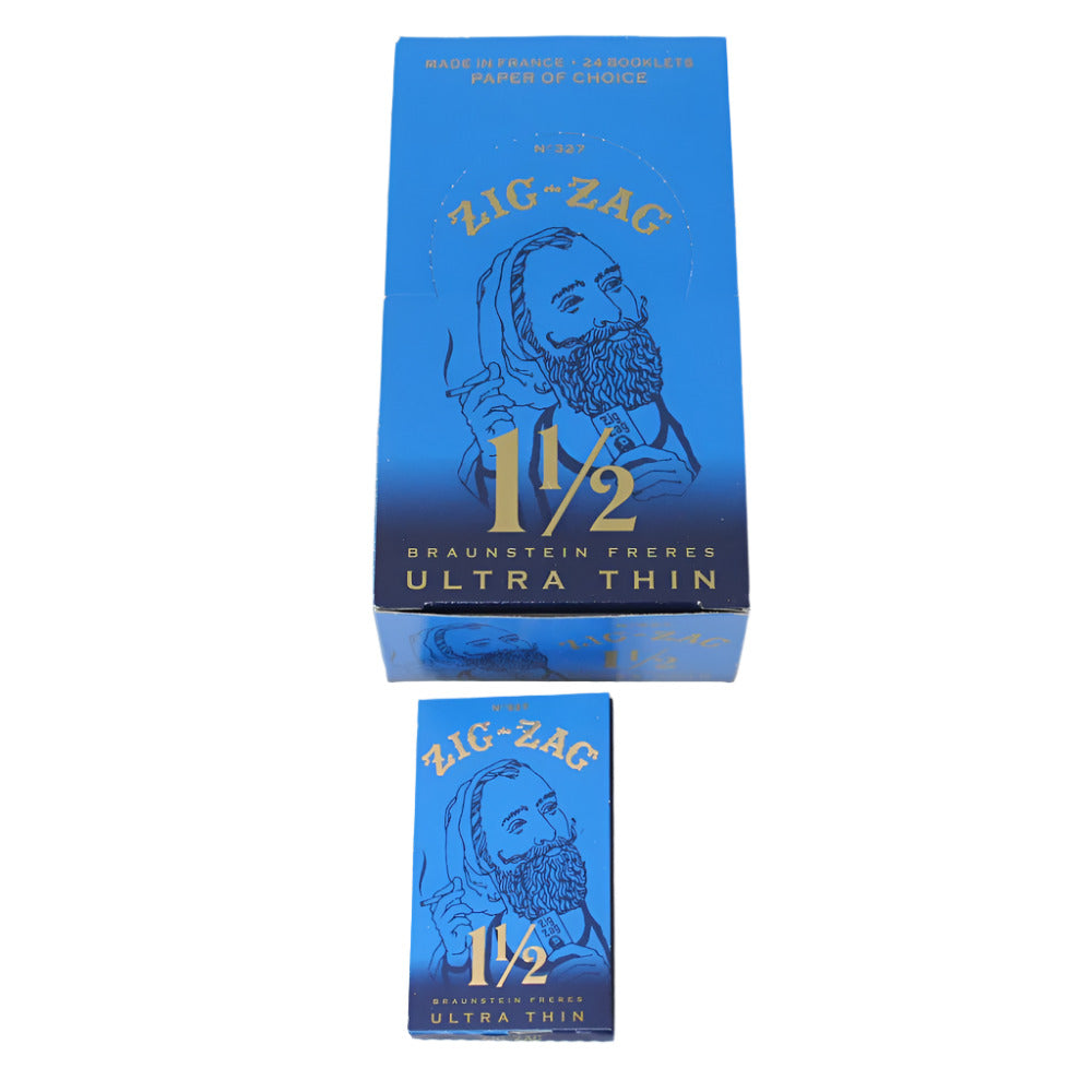 Zig-Zag 1 1/2 Ultra Thin Cigarette Papers in a 24-Booklet Pack, Featuring Classic Zig-Zag Branding, Ultra-Thin Paper Design, and Compact Packaging for Retail and Wholesale Collections.